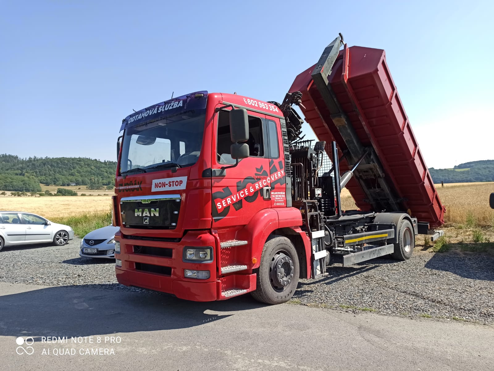 Kontejnerová doprava — naložení hydraulickou rukou